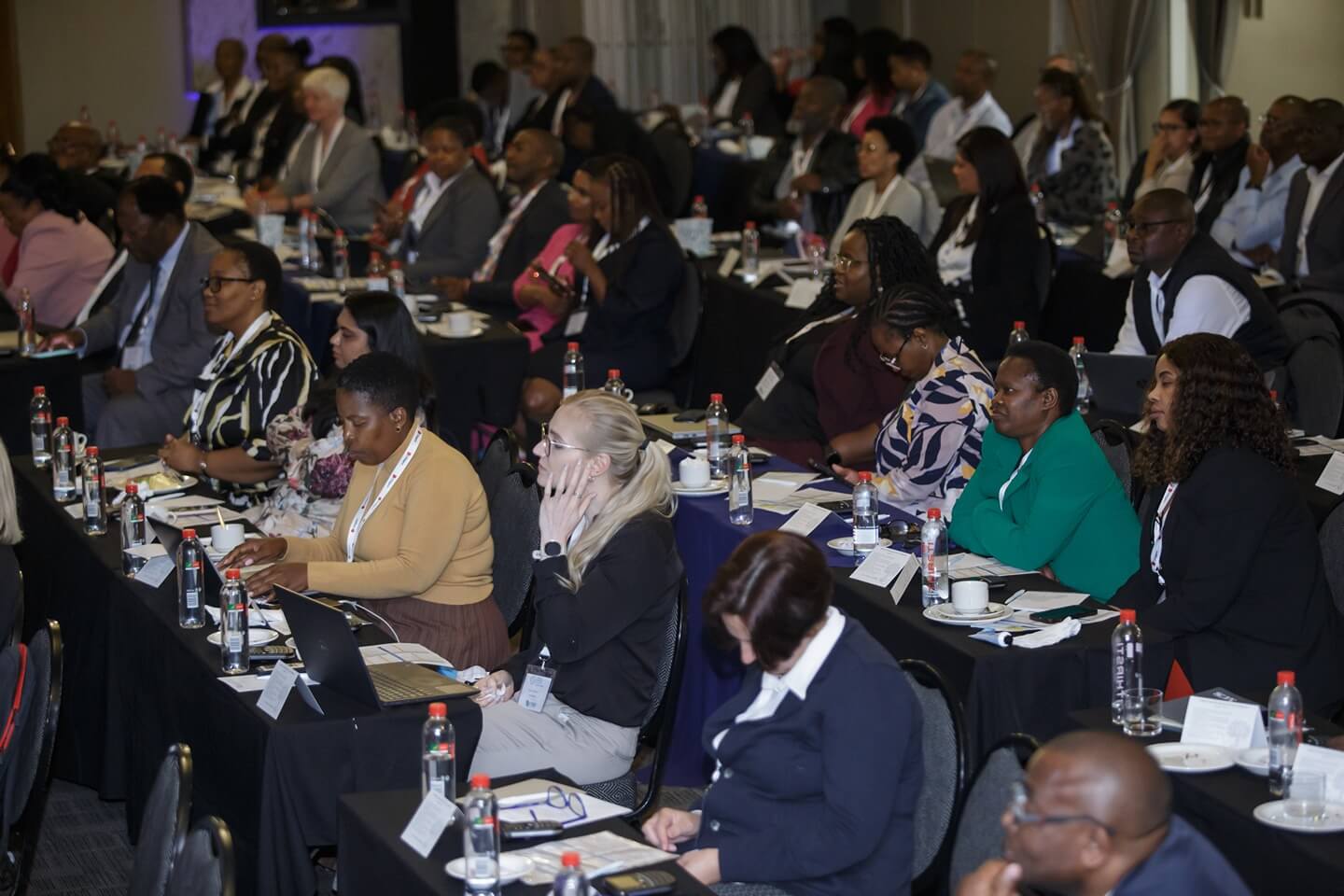 Delegates listening to the speeches